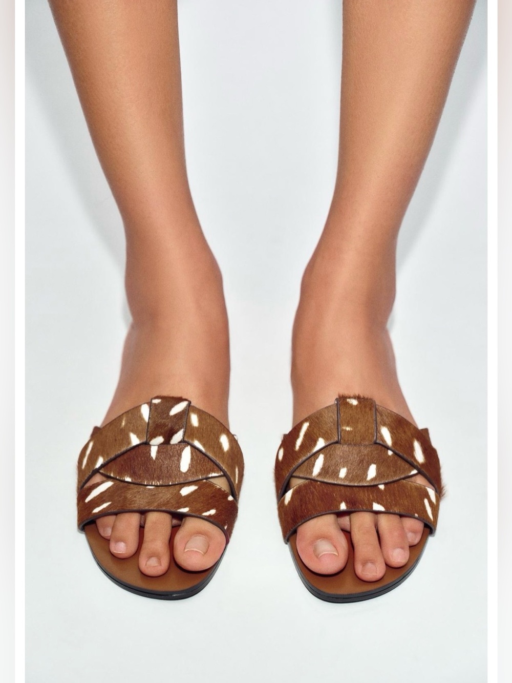 Zara NWT Brown Cow Print Faux Fur Cross Strap Flat Sandals - Picture 1 of 9